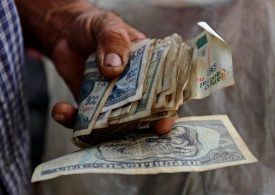 Cuba adopting single exchange rate in January, in first devaluation since revolution