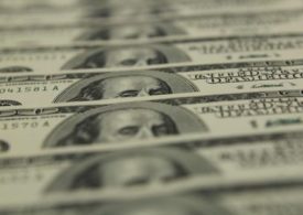 Dollar Edges Lower; Fed Retains Easy Policy Stance