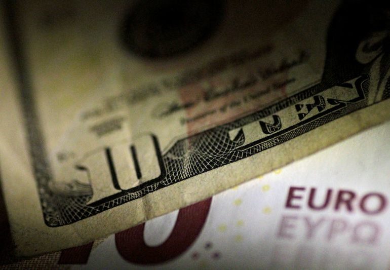 Dollar hovers near seven-week high after boost from euro selloff