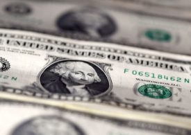 Dollar defensive as Treasury yields slip from near 14-month highs