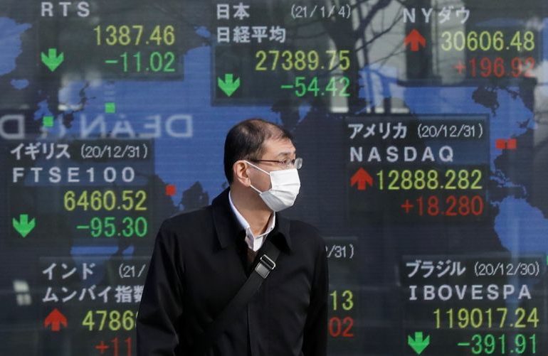 Asia shares edge higher, oil slips as Suez Canal ship re-floated