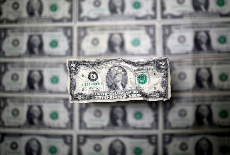 U.S. dollar to remain strong for at least another month: Reuters poll