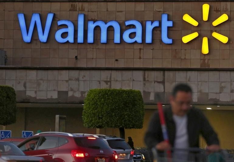 Walmart says fully vaccinated employees can go without masks starting Tuesday By Reuters