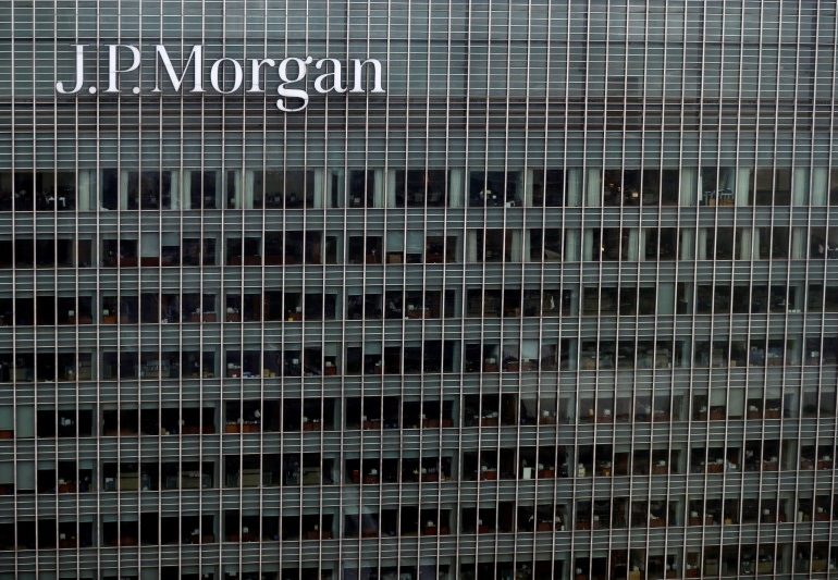 Macron rolls out red carpet to JPMorgan, global CEOs in post-Brexit push By Reuters