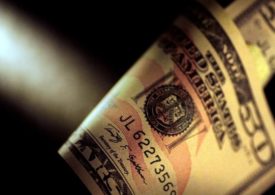 Dollar Edges Lower, But Remains Near 20-Year High By Investing.com
