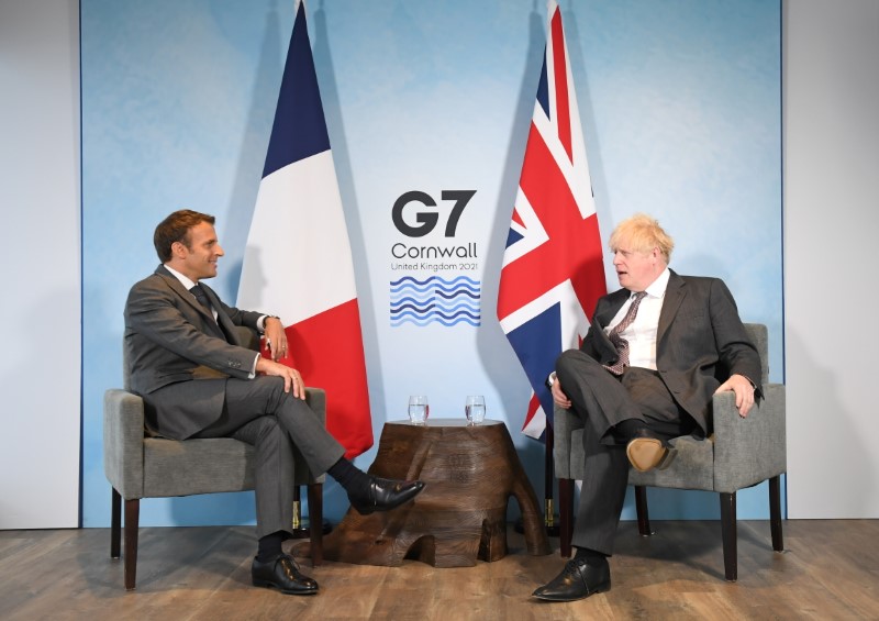 Exclusive-Macron offers UK's Johnson 'Le reset' if he keeps his Brexit word