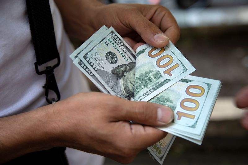 Dollar Flat Ahead of PMIs, Fed Meeting; Ruble Weaker Again on War Fears